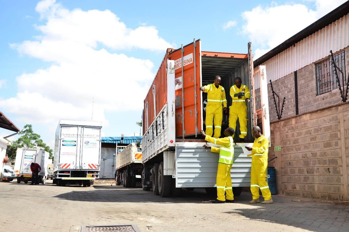 Global freights employees offloading a lorry 